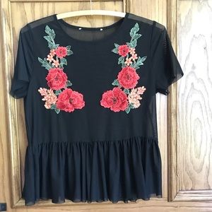 black mesh top with floral patches